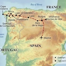 Pilgrims walking along the Camino de Santiago in Spain