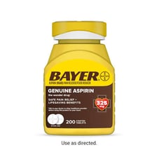A bottle of aspirin displayed as an over-the-counter medicine.