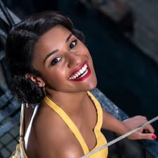 An image of Anita from a production of West Side Story.