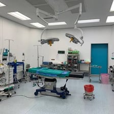 A modern hospital operating room prepared for surgery