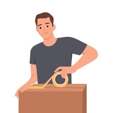 A person holding belongings they own.