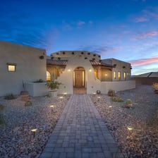 A traditional Pueblo-style building made of adobe.