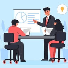 A representative meeting with a client at a desk