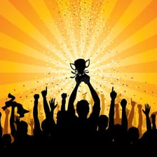 A crowd cheering in celebration.