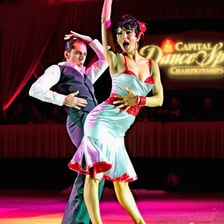 Dancers performing a lively mambo