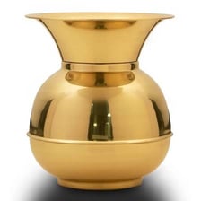 An antique brass spittoon.