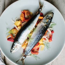A fresh sardine fish shown whole