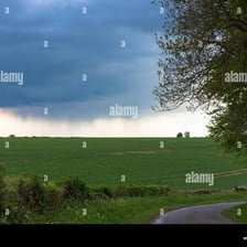 A dark, overcast sky with heavy grey clouds