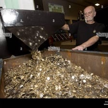 Coins and minting equipment associated with the Royal Mint