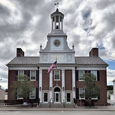 The exterior of a town hall building.