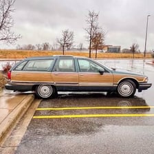 A station wagon estate car parked outdoors
