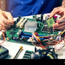 A technician installing information-technology equipment.