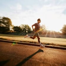 A person running along an outdoor path.