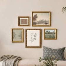 A framed picture displayed on a wall.