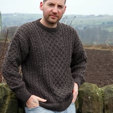 A knitted sweater, or jumper