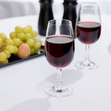 A glass of dark red port, a fortified wine