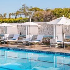 A hotel swimming pool presented as a guest amenity.