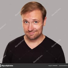 A person wearing a visibly conceited or smug expression
