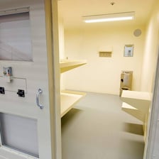 The interior of a prison cell.