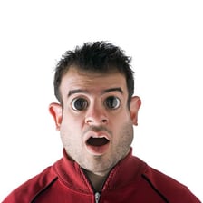 An expressive portrait suggesting silly or irrational behaviour