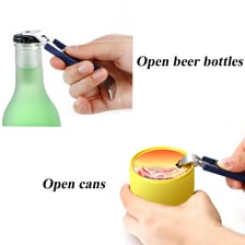 A handheld metal bottle opener lifting the cap from a glass bottle.