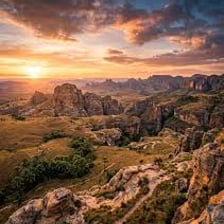 A landscape viewed at sunset, representing the end of the day.