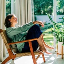 A person in a comfortable room inside a home