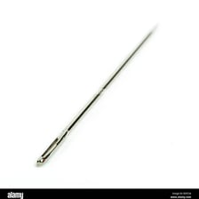 A metal sewing needle shown in close-up.