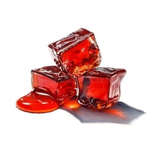 Red jelly slowly dripping and oozing from a spoon