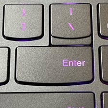 A computer keyboard with the backslash key visible