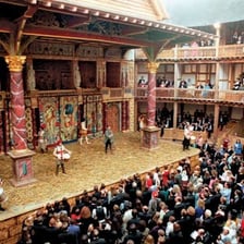 A live performance taking place on a theatre stage