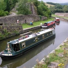 A barge travelling along a canal