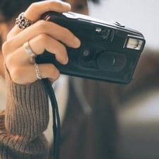 A camera being used to take a photograph.