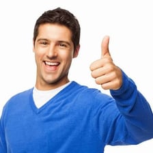 A person making a thumbs-up hand gesture