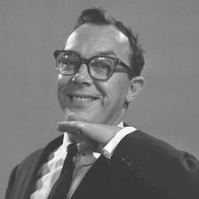 A portrait of the British comedian Eric Morecambe.