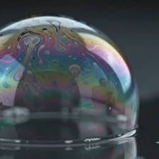 A soap bubble, a familiar example of something short-lived.