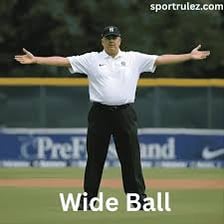 A cricket umpire signaling an extra such as a wide.