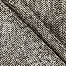 A close-up view of woven tweed fabric