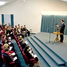 A congregation of Jehovah's Witnesses gathered for a religious meeting