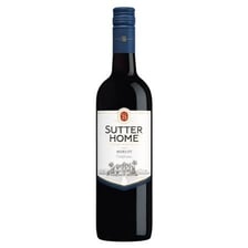 A glass and bottle of Merlot red wine.