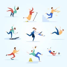 A person awkwardly dropping objects.