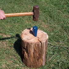 A piece of wood visibly split into sections.