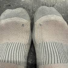 A lone sock lying without its matching pair.