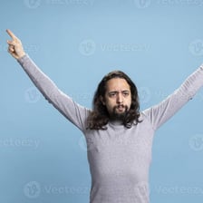 A person celebrating with an expression of intense happiness.