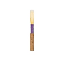 A small reed beside a woodwind instrument
