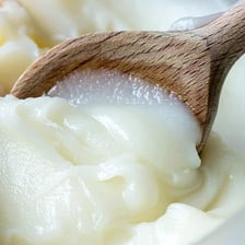A bowl containing white lard for cooking