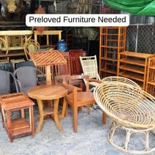 Previously owned furniture displayed in a second-hand shop.