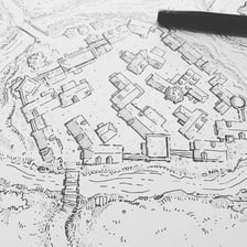 A cartographer creating a revised map