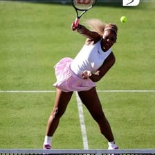 Tennis players competing during a match.