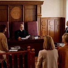 A defendant speaking in a courtroom during a legal case